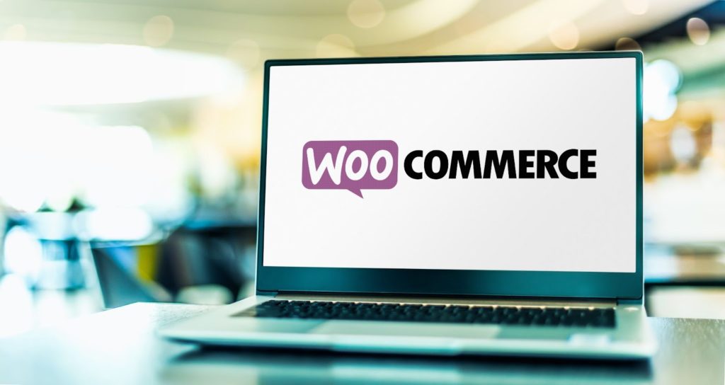 WooCommerce logo on laptop screen